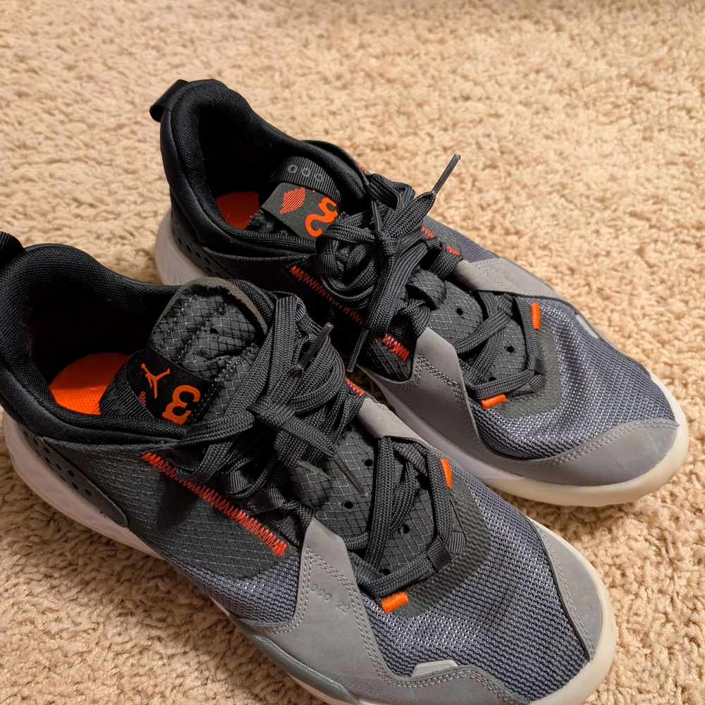 Jordan Deltas Gray and Black Sneakers with Vibrant Orange Accents